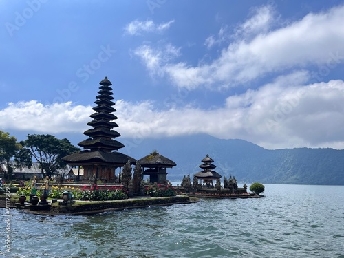 A collection of stunning photos showcasing the diverse beauty of Bali, Indonesia. From pristine beaches with golden sands and turquoise waters to ancient temples adorned with intricate carvings, and m