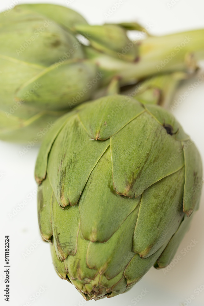 Fototapeta premium 2 artichokes on a white background