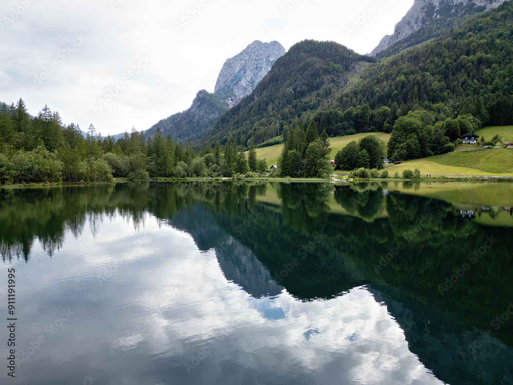 Forest lake Hintersee between mountains and forest in Berchtesgaden, Bavaria Forest lake Hintersee between mountains and forest in Berchtesgaden, Bavaria