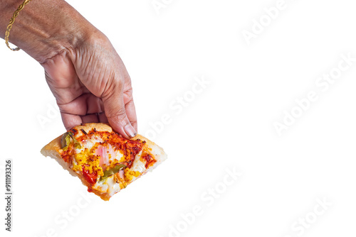 Female hand holding a slice of pizza isolated on a white background.