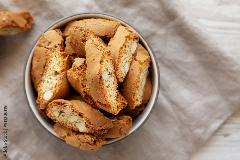Homemade Almond Cantuccini Pastry in a Bowl, top view. Copy space. Homemade Almond Cantuccini Pastry in a Bowl, top view. Copy space.