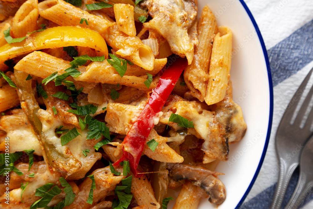 Homemade Fajita Pasta Bake on a Plate, top view. Flat lay, overhead, from above. Close-up.