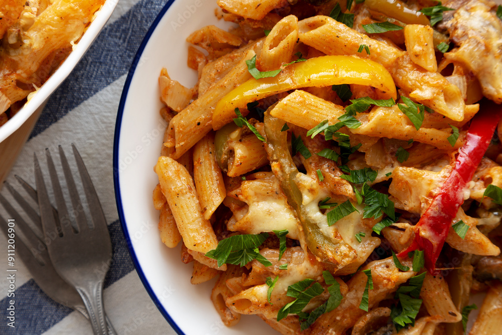 Homemade Fajita Pasta Bake on a Plate, top view. Flat lay, overhead, from above. Close-up. Homemade Fajita Pasta Bake on a Plate, top view. Flat lay, overhead, from above. Close-up.