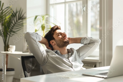 person relaxing in his home office