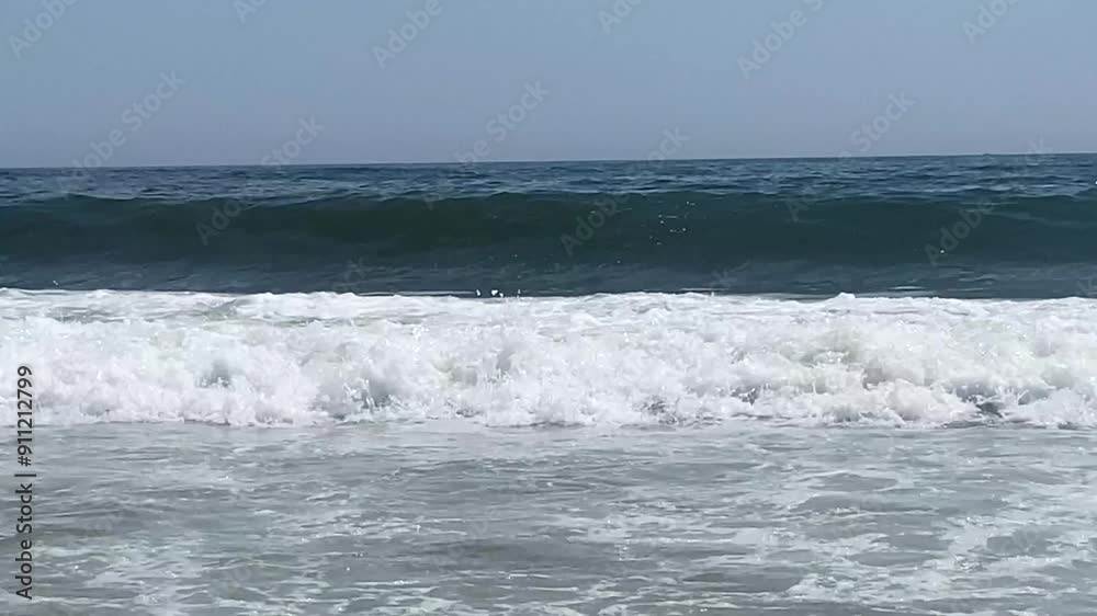 Close up of many large waves crashing onto the shore of the beaches of Long Island. Close up of many large waves crashing onto the shore of the beaches of Long Island.