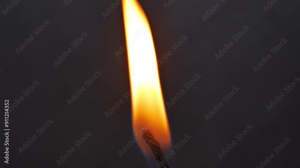 Flame from a candle, Close-up of flame Flame from a candle on black background Flame from a candle, Close-up of flame Flame from a candle on black background
