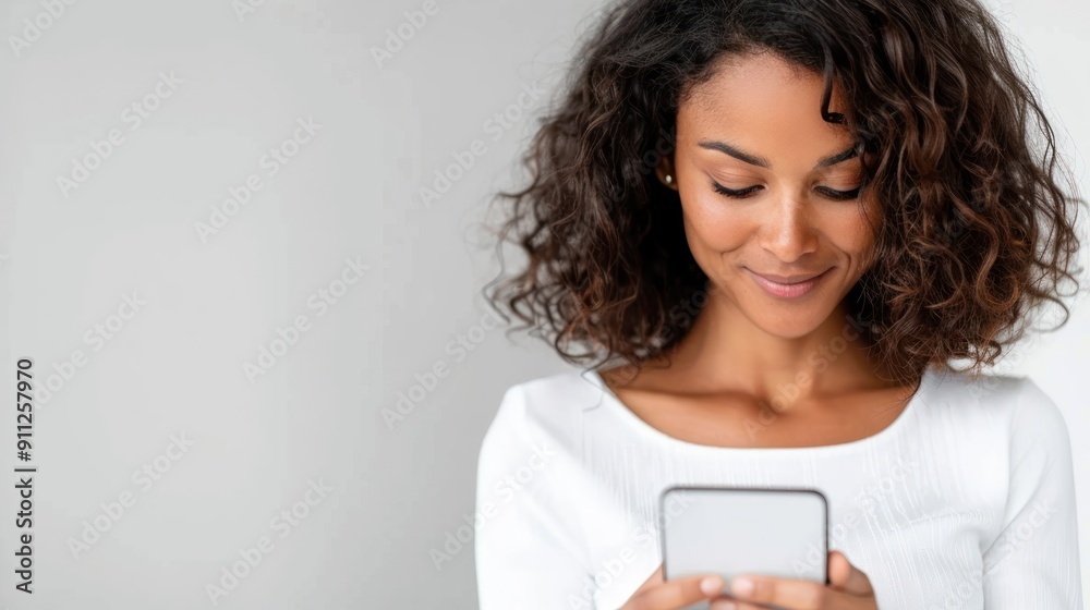 A professional woman using a smartphone to apply for jobs online while commuting A professional woman using a smartphone to apply for jobs online while commuting