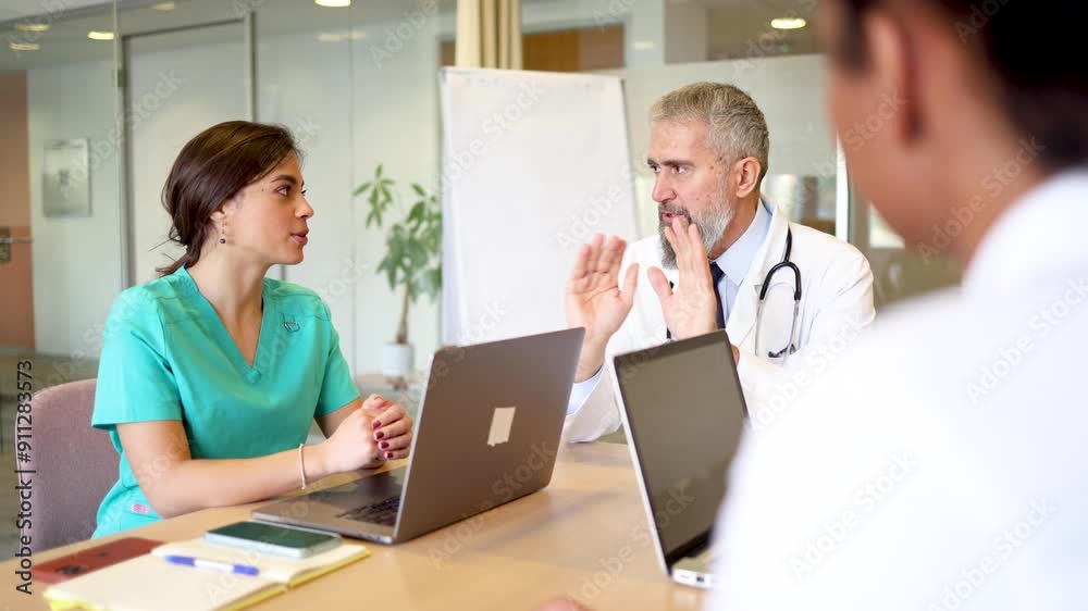 Multiracial medical team having a meeting Multiracial medical team having a meeting