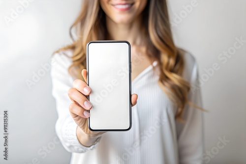 Woman's hand holding a smartphone mock up, one hand showing on a white background