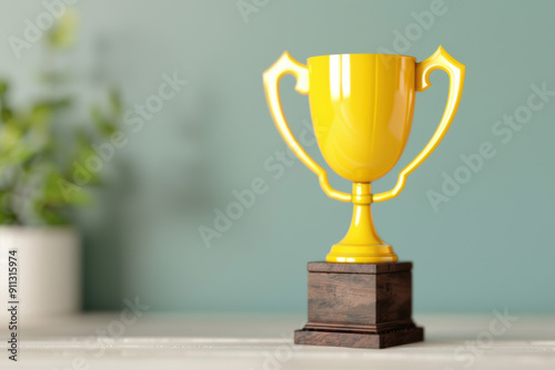 A vibrant yellow trophy with a wooden base, displayed prominently on a table against a muted background, symbolizing achievement and success.
