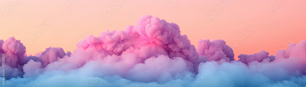 Fototapeta premium Beautiful dreamy sky with fluffy pink clouds at sunset, creating a serene and tranquil atmosphere perfect for backgrounds and banners.