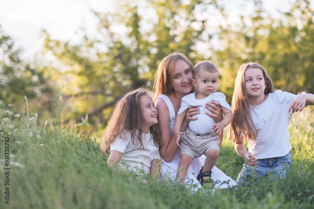A beautiful Family Portrait captured amidst the serene beauty of Nature and greenery A beautiful Family Portrait captured amidst the serene beauty of Nature and greenery