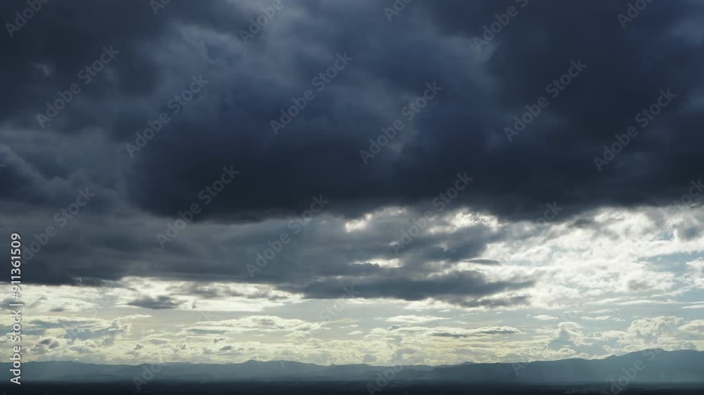 Time-lapse of Nature Environment Dark huge cloud sky black stormy cloud motion big stormy rain day thunderstorm clouds dancing panorama horizon Time lapse blue cloud on the hills of the valley Time-lapse of Nature Environment Dark huge cloud sky black stormy cloud motion big stormy rain day thunderstorm clouds dancing panorama horizon Time lapse blue cloud on the hills of the valley