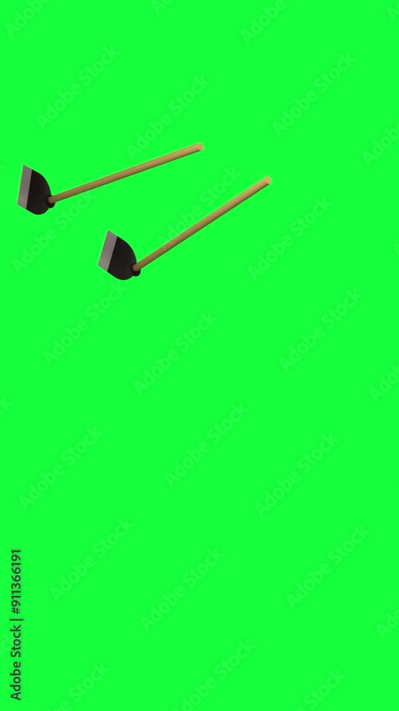 Wooden and Iron Hoe Tool falling on a green screen chroma key background. For Agricultural , Farm ,Cultivator or Garden purpose.Farming work equipment falling down on new green background. Vertical