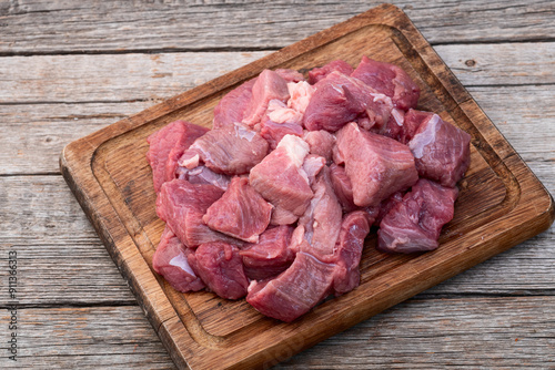 Beef cubes . Photography of raw cutting meat