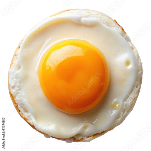 A top view of a fried egg with a bright yellow yolk and white egg white, perfect for breakfast dishes. Isolated on transparent background, png. photo