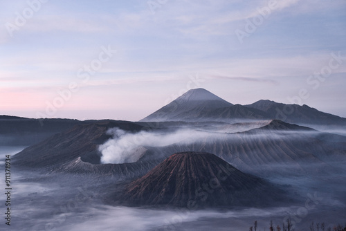 Mount Bromo volcano (Gunung Bromo) during sunrise on Mount Penanjakan, in East Java, Indonesia. photo