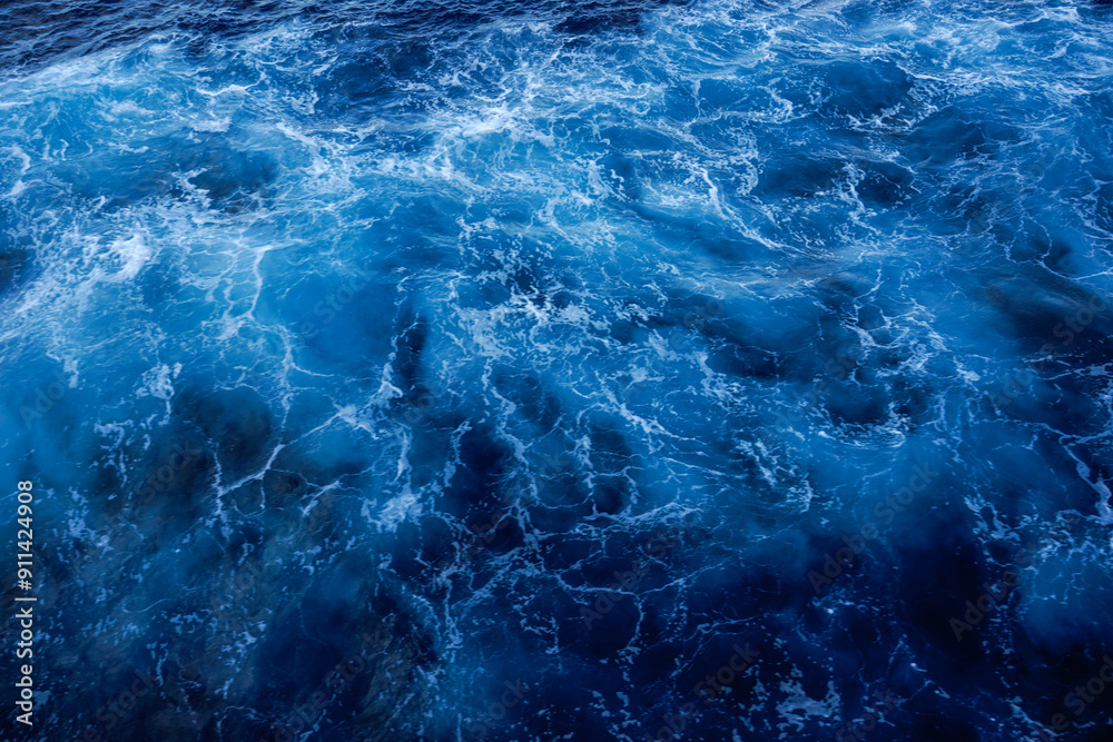 Natural blue waters with white caps. View from a ship. Ocean water. Natural blue waters with white caps. View from a ship. Ocean water.