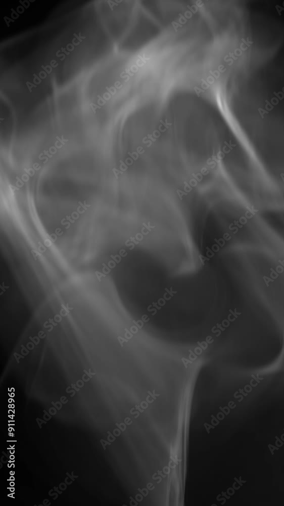 White smoke that rises slowly and floats suspended in the air. The steam rises with light and graceful twists on a black background. It can come from a cigarette or incense. Vertical, phone wallpaper White smoke that rises slowly and floats suspended in the air. The steam rises with light and graceful twists on a black background. It can come from a cigarette or incense. Vertical, phone wallpaper