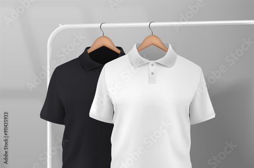 Black short sleeve polo shirt hanging on a clothes rack in a studio on a wooden hanger. t-shirt sleeve design for mockup.