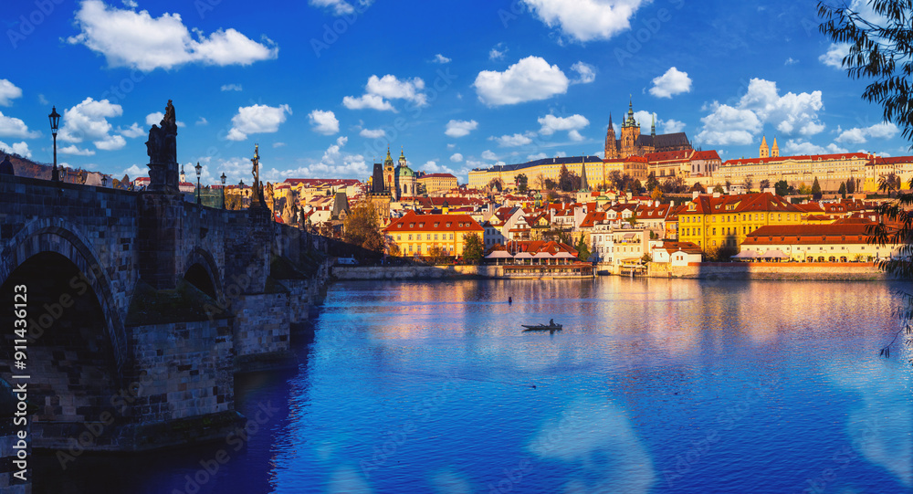 Fototapeta premium Cityscape - view of the Hradcany historical district of Prague with the castle complex Prague Castle and the Vltava River with the Charles Bridge, Czech Republic, 8 November, 2022
