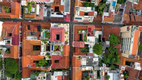 Beautiful aerial view of the walled city of Cartagena de Indias, in Colombia - the Santuario de San Pedro Claver, Torre del Reloj and the Catedral de Santa Catalina de Alejandría photo