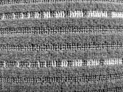 Cloth abstract pattern close macro view, textile abstract background. Black and white monochrome grayscale photo photo