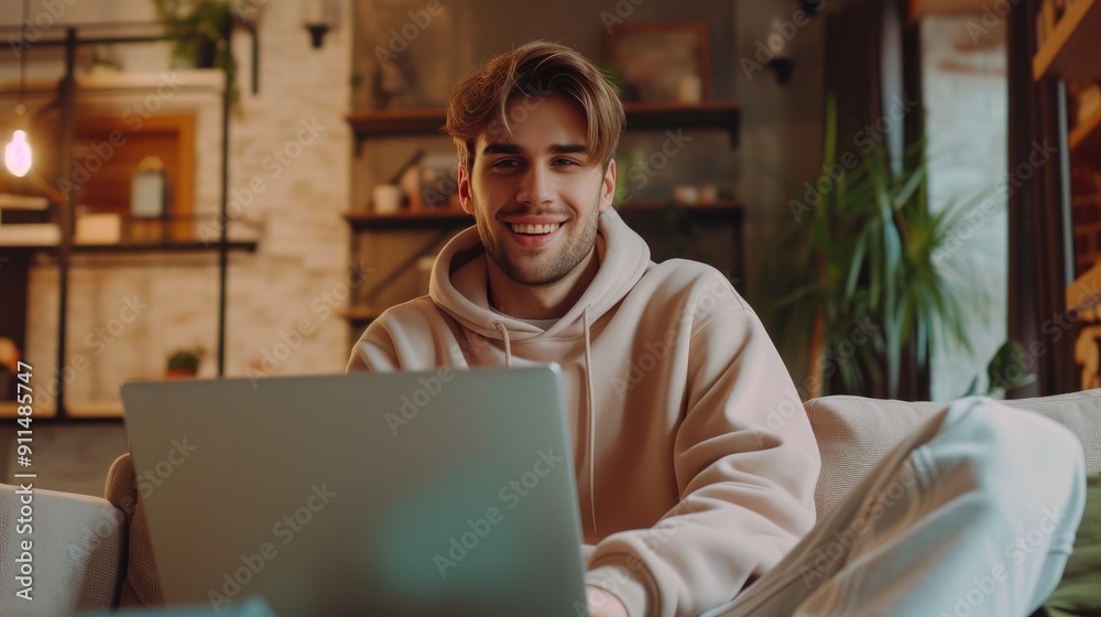 Happy Guy Working Online in Trendy Home Interior