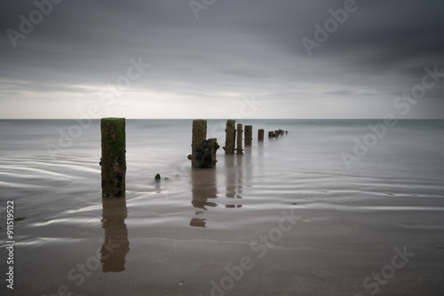 Youghal Strand Groynes on a warm summer morning just before the rain comes