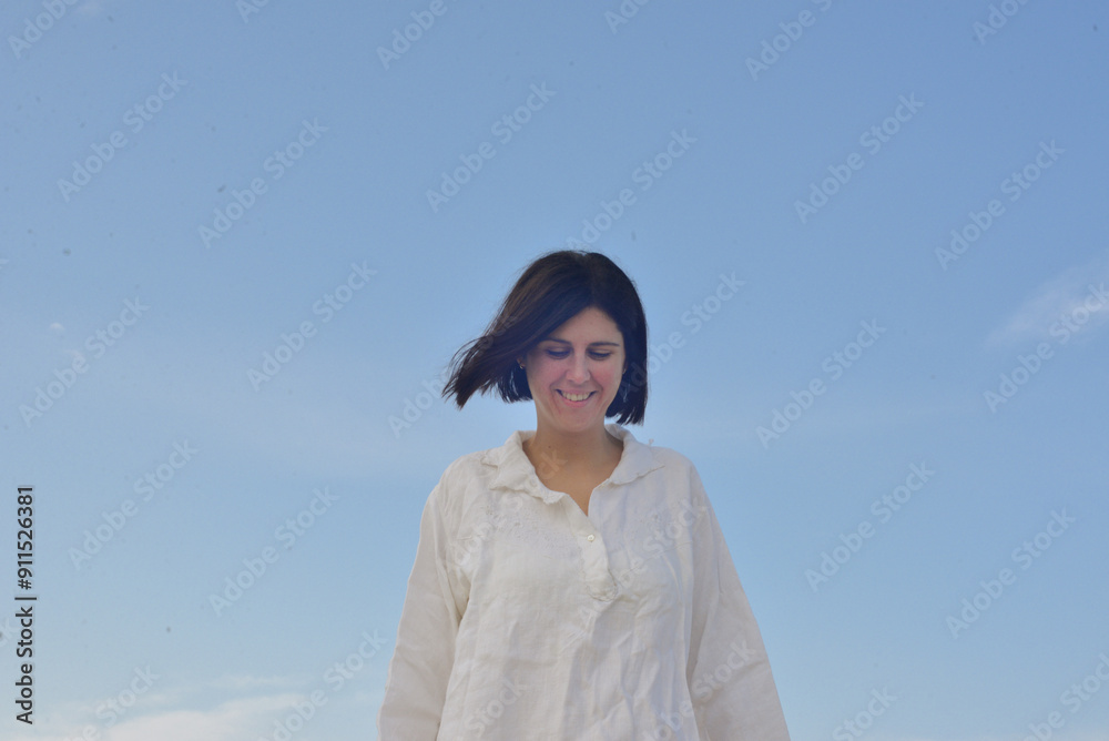 A happy woman in a sea on a beach A happy woman in a sea on a beach