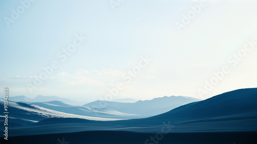 A mountain range with a clear blue sky