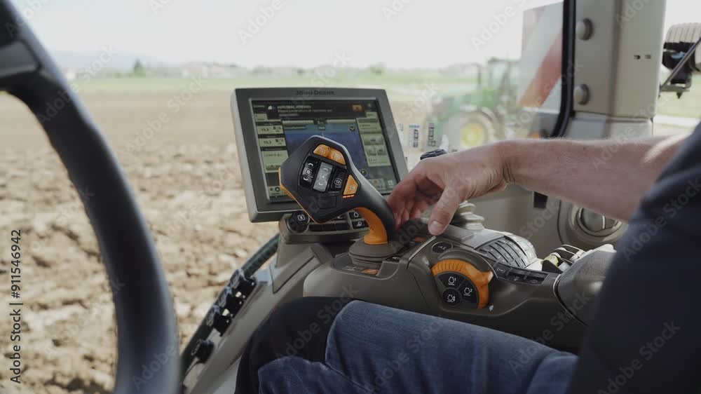 A farmer using precision agriculture and other modern farming techniques to improve agricultural profitability. The image showcases the importance of farming solutions and the use of farm equipment in A farmer using precision agriculture and other modern farming techniques to improve agricultural profitability. The image showcases the importance of farming solutions and the use of farm equipment in