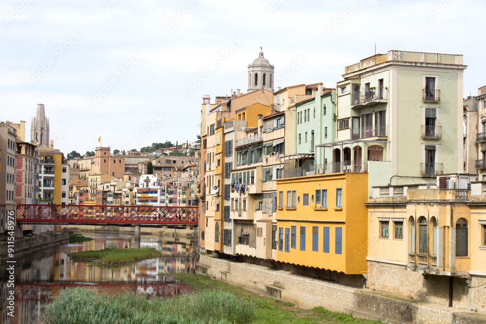 Naklejka premium View of the old town and river on a summer day. Gerona. Spain.