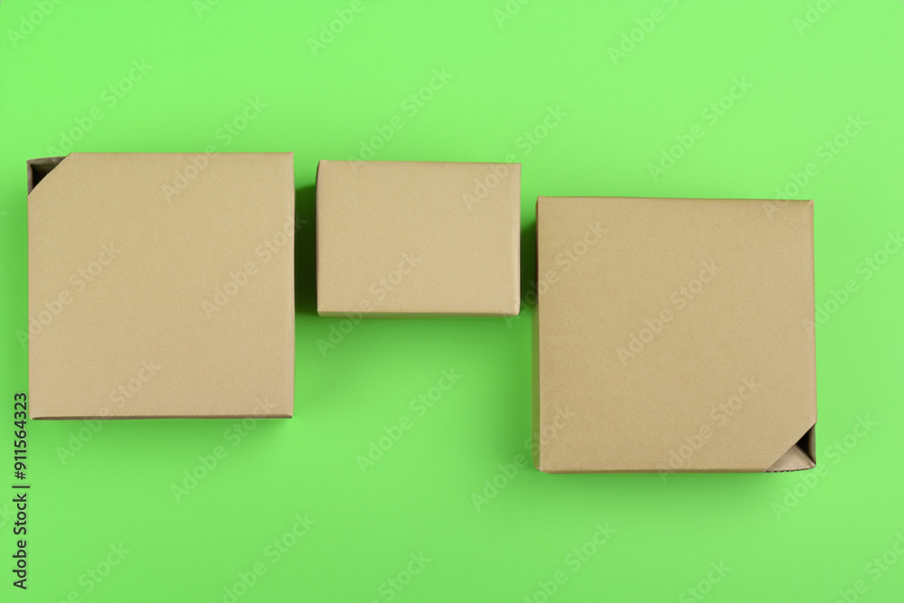 Box of paper with greens on the . box gift present concept. a box of green and brightly colored paper on a white . a box of brightly colored paper lifestyle with a green. Box of paper with greens on the . box gift present concept. a box of green and brightly colored paper on a white . a box of brightly colored paper lifestyle with a green.