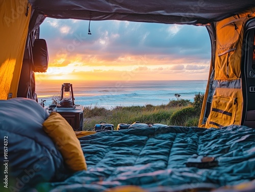 Coastal view from inside vehicle at sunrise campsite photo