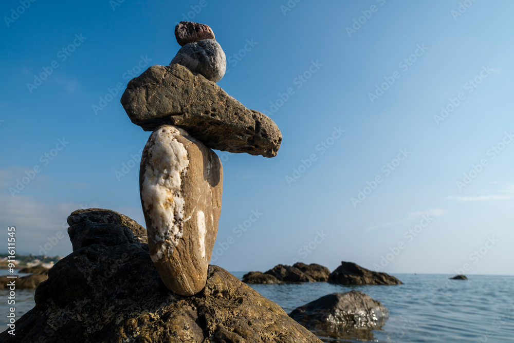 balanced stones on the rocks of the sea
balanced stones on the rocks of the sea