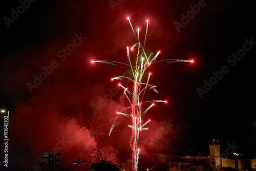 Fireworks Display at Fiesta de la Anunciada in Bayona with Parador Backdrop photo