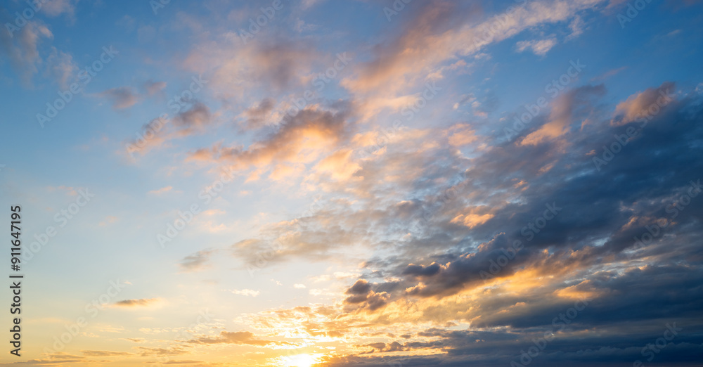 Sunset or sunrise. Dramatic majestic scenery sunset. Sky with clouds in sunset sky light background. Sunrise with clouds in various shapes. Calm sunset sky and sun through clouds over. Sunset or sunrise. Dramatic majestic scenery sunset. Sky with clouds in sunset sky light background. Sunrise with clouds in various shapes. Calm sunset sky and sun through clouds over.