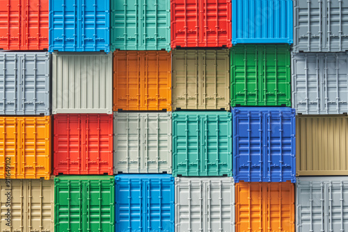 Bright containers stacked in rows and forming symmetrical pattern