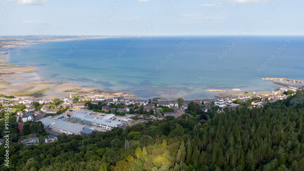Aerial view on houses on coast of see in Newcastle, Northern Ireland. Coastal town, Drone photo Aerial view on houses on coast of see in Newcastle, Northern Ireland. Coastal town, Drone photo