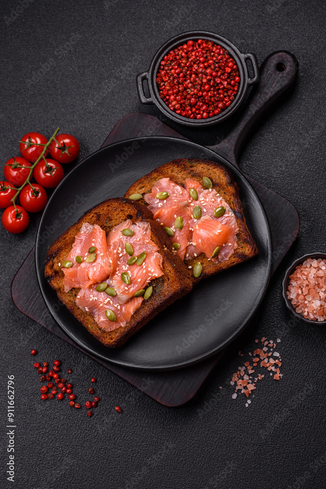Sandwich or bruschetta with toast, salmon, cream cheese Sandwich or bruschetta with toast, salmon, cream cheese