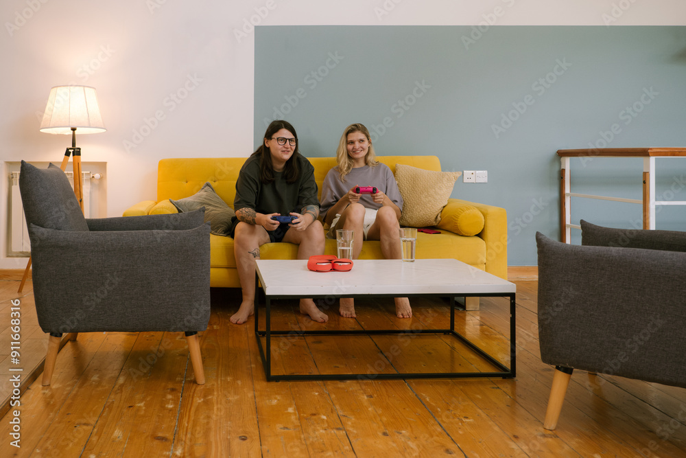 Women friends playing video game