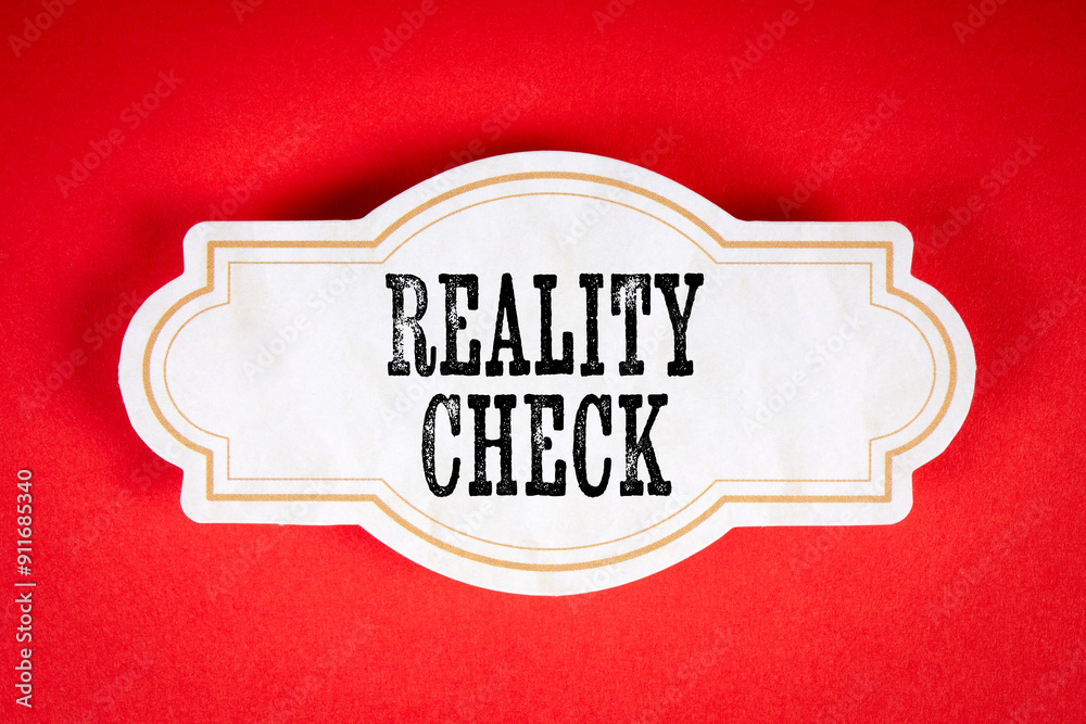 Reality Check. Cardboard sticker with text on a red background Reality Check. Cardboard sticker with text on a red background