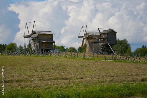 Three mills in a field