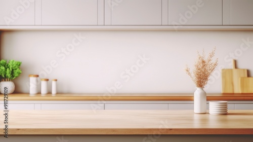 Empty dinning table with blurred kitchen background