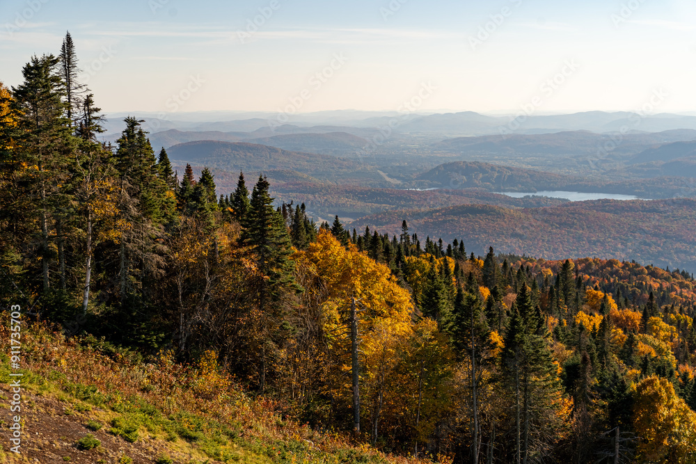 Mont Tremblant village at fall as the foliage change for vibrant colors, Quebec, Canada Mont Tremblant village at fall as the foliage change for vibrant colors, Quebec, Canada