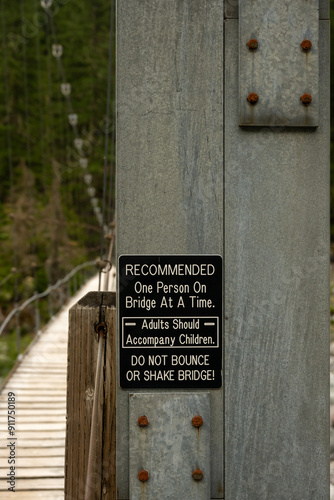 Instructional Sign Mounted On The Carbon River Suspension Bridge In Mount Rainier