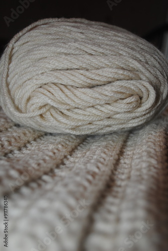 cream yarn with crochet blanket