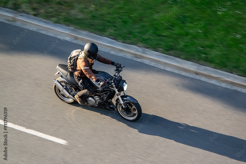 Rider on motorcycle with motion blur effect Rider on motorcycle with motion blur effect