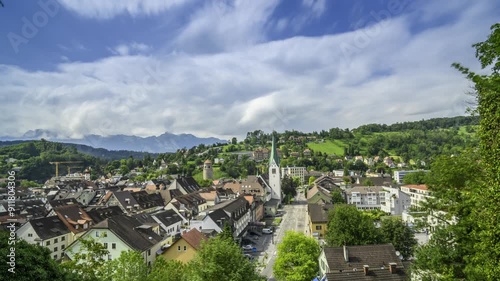 The City of Feldkirch in the State of Voralberg, Austria, towards the Swiss Mountains. Timelapse Video taken from the Schattenburg Castle during sunset. 